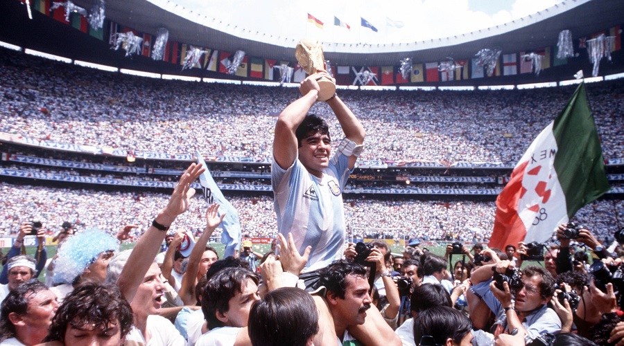 BT Sport, Football 1986 World Cup Final, Azteca Stadium, Mexico, 29th June, 1986, Argentina 3 v West Germany 2, Argentina's Diego Maradona proudly holds aloft the World Cup trophy amongst masses of fans and photographers