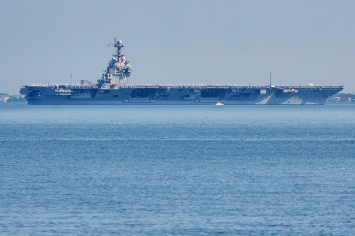 El portaaviones USS Gerald R. Ford saliendo de la Base Naval Norfolk, en Norfolk, Virginia, el 23 de junio del 2025. (AP foto/John Clark)